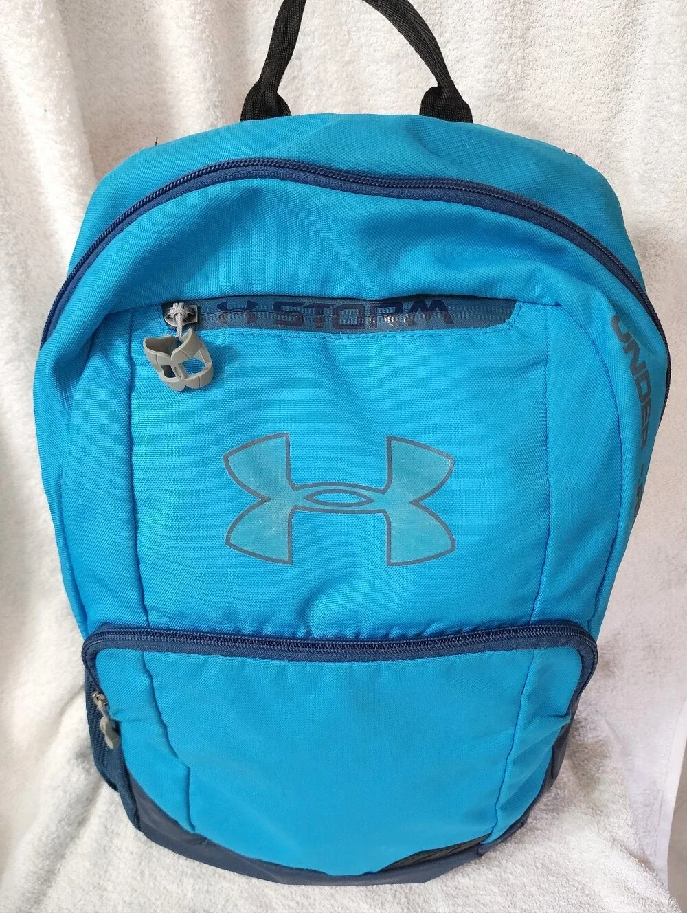 M.169- Under Armour Storm Backpack, blue teal, USED